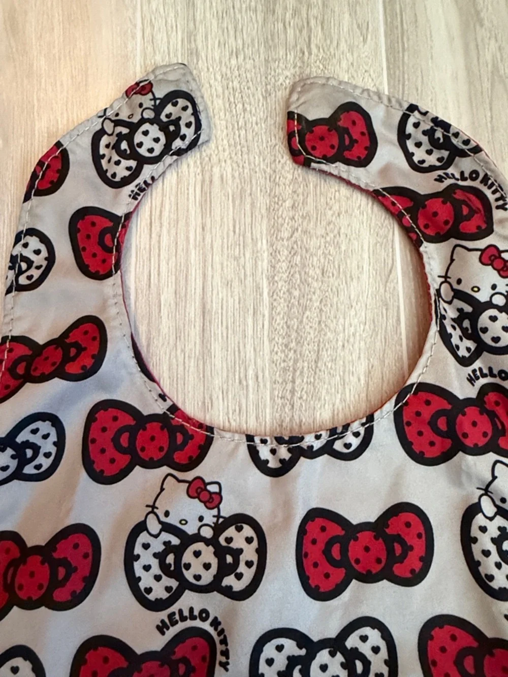 Ju-Ju-Be Hello Kitty Red and White Baby Bib with Bow Motif